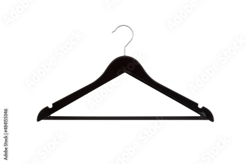 Empty wooden hanger isolated on a white background. Potential copy space above and inside clothes hangers. Coat hanger close up. photo