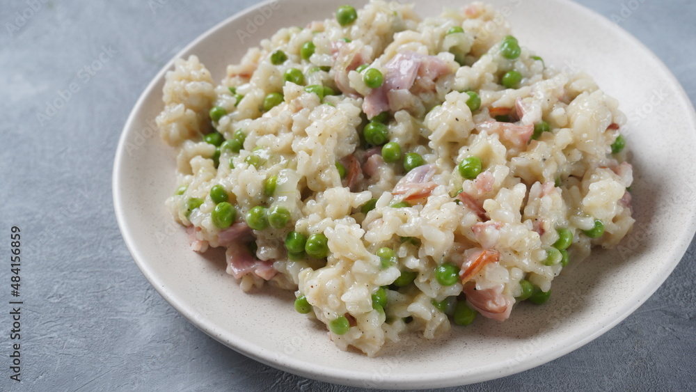 Classic italian risotto with peas, cheese parmesan, prosciutto. Risi e Bisi (Venetian-style rice and peas) Classic italian risotto with peas, cheese parmesan, prosciutto. Risi e Bisi (Venetian-style rice and peas)