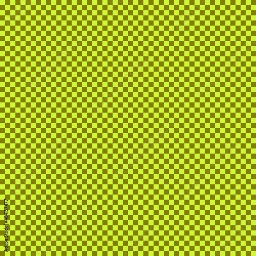 Checkerboard with very small squares. Olive and Lime colors of checkerboard. Chessboard, checkerboard texture. Squares pattern. Background.
