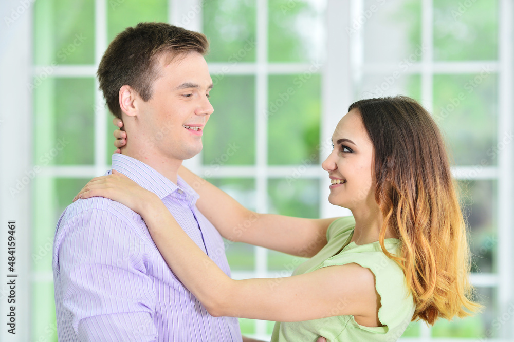 Portrait of happy young couple posing at home Portrait of happy young couple posing at home