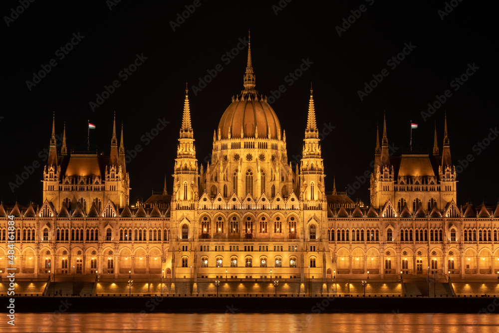 Hungarian parliament building from across the Danube river at night Budapest Hungary Europe