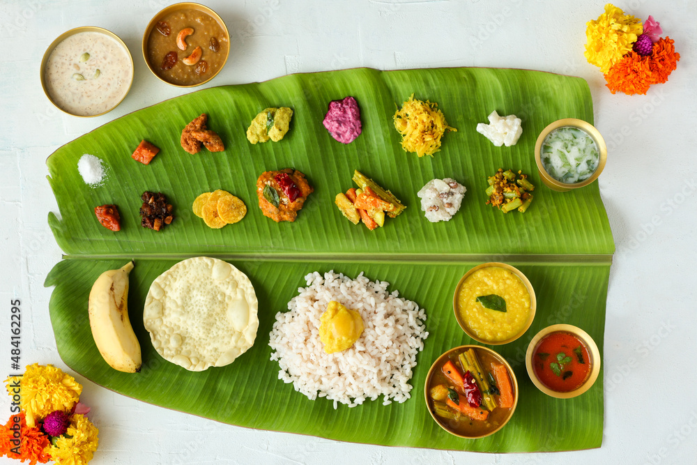 Traditional Onam sadhya rice Sambar, Rasam, parippu dal curry ghee ...