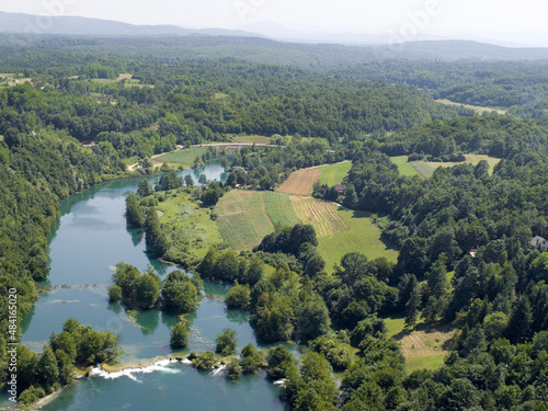 An aerial shot of The Mreznica river in Karlovac county in Croatia photo