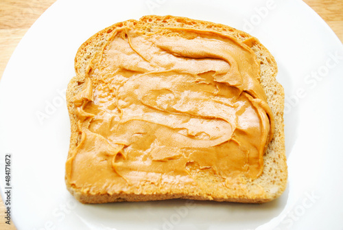 Peanut Butter Spread on Wheat Bread	