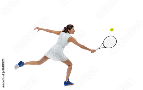 Portrait of young sportive woman, tennis player playing tennis isolated on white background. Healthy lifestyle, fitness, sport, exercise concept.