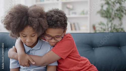 Canvastavla Loving brother hugging upset sister family support and care, siblings friendship