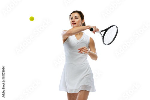 One young female tennis player playing tennis isolated on white background. Healthy lifestyle, fitness, sport, exercise concept. © master1305