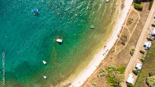 Aerial drone view of ocean sea coast at summertime tourist seaso