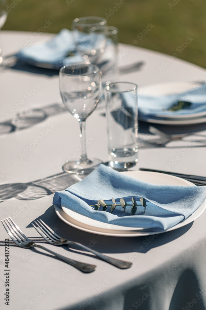 Fototapeta premium stylish luxury decorated tables for the celebration for a wedding. cathering in the restaurant outdoor