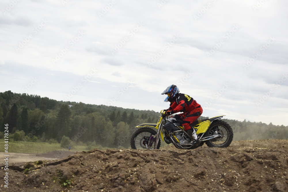 motocross bikers on motorcycles with carrycot motocross bikers on motorcycles with carrycot
