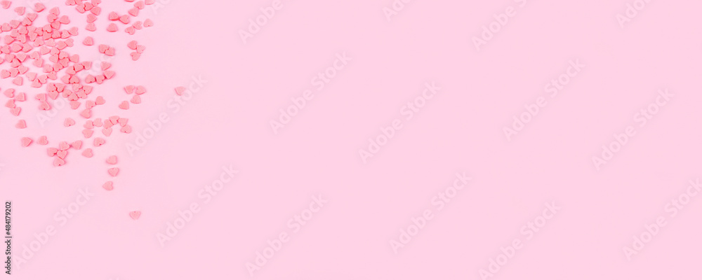 Pink background with tiny hearts. Valentine's day concept.