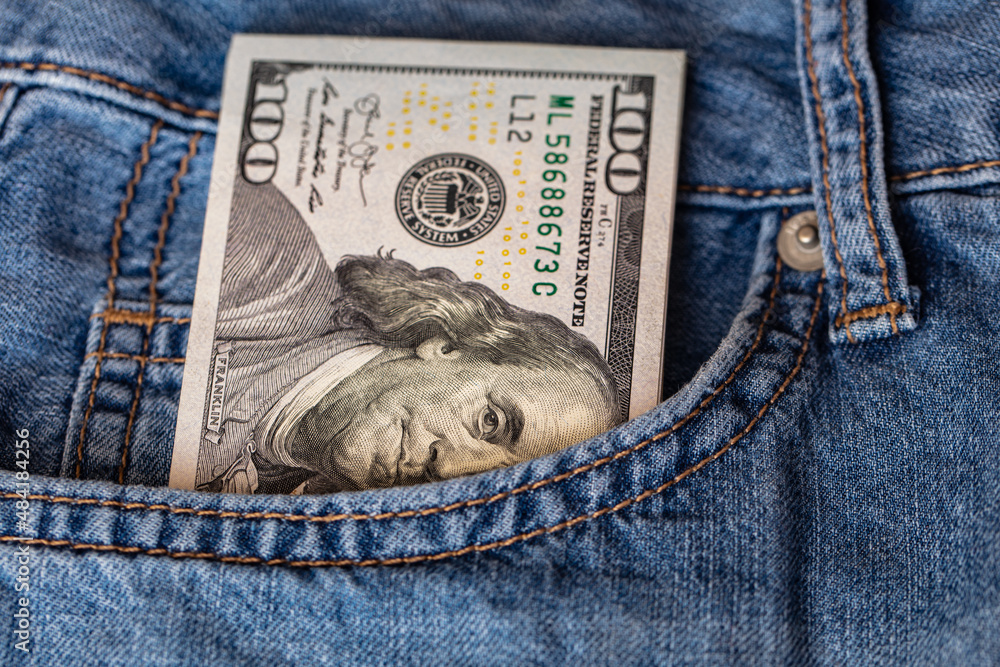 100 dollar banknote in jeans pocket 100 dollar banknote in jeans pocket