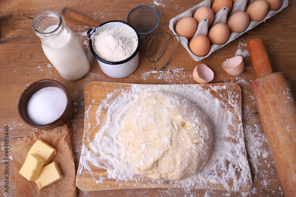 Dough preparation recipe bread, pizza or pie making ingridients, food flat lay on kitchen table background. Dough preparation recipe bread, pizza or pie making ingridients, food flat lay on kitchen table background.