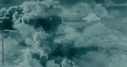 Flight over the stormy clouds