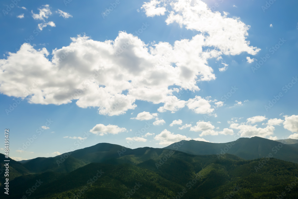Fototapeta premium Beautiful landscape with mountains and blue sky. Drone photography