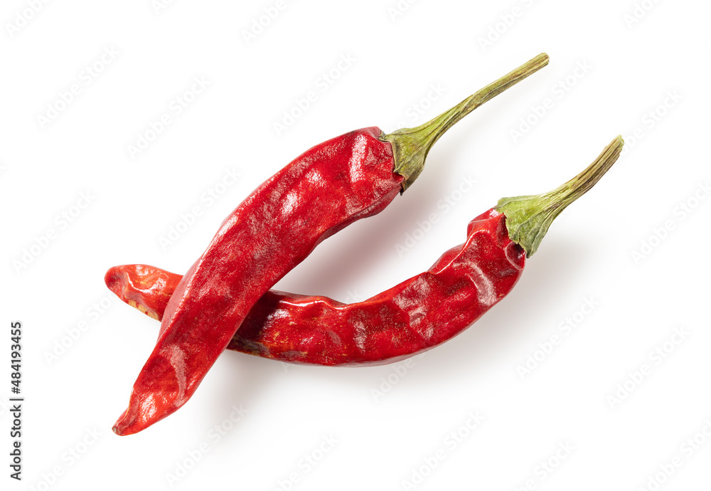 Dried chili peppers on a white background. - obrazy, fototapety, plakaty 