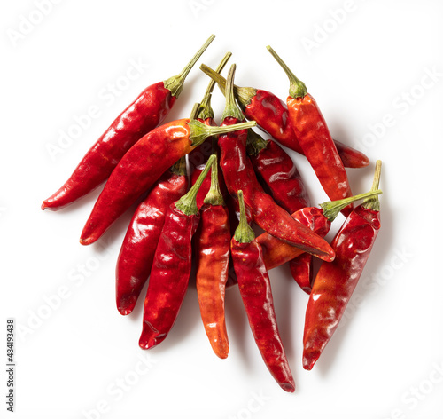 Dried chili peppers on a white background.