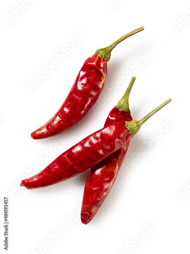Canvastavla Dried chili peppers on a white background.