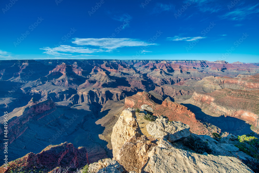 Scenic overlook of the Grand Canyon South Rim at summer sunrise, Arizona.