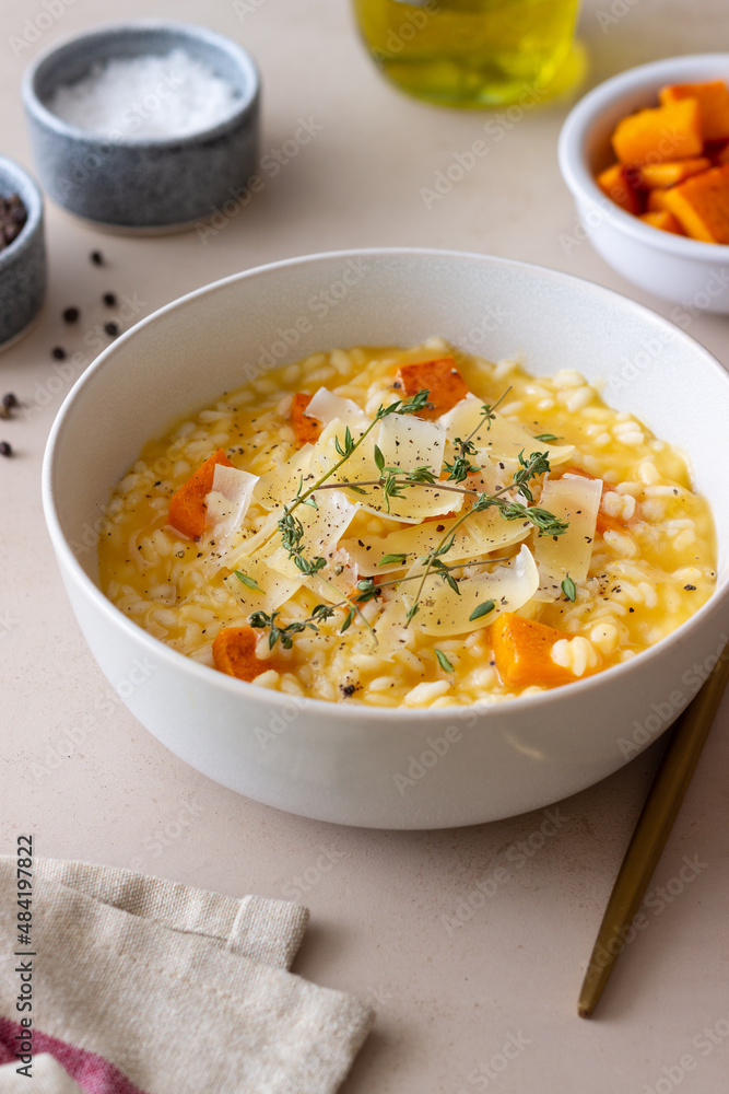 Risotto with pumpkin, cheese and thyme. Vegetarian food. Healthy eating.