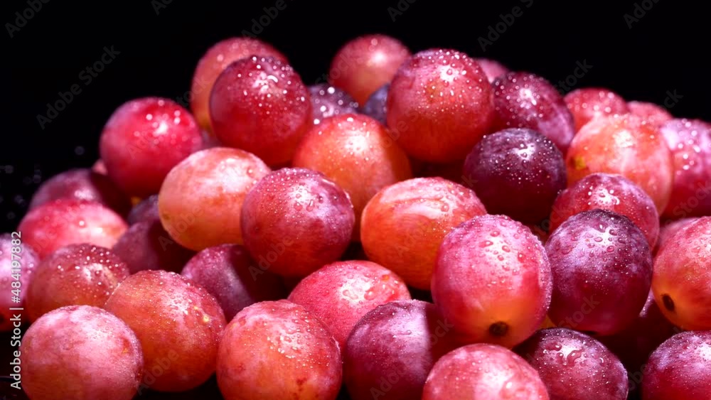 Fresh red grapes rotation background. Close up. Loop motion Fresh red grapes rotation background. Close up. Loop motion