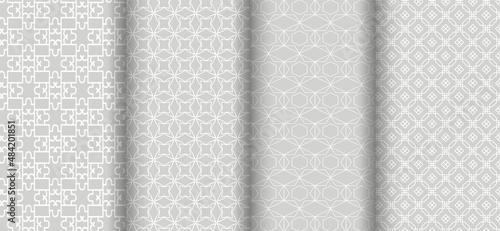 Decorative patterns with geometric ornament on a gray background - set