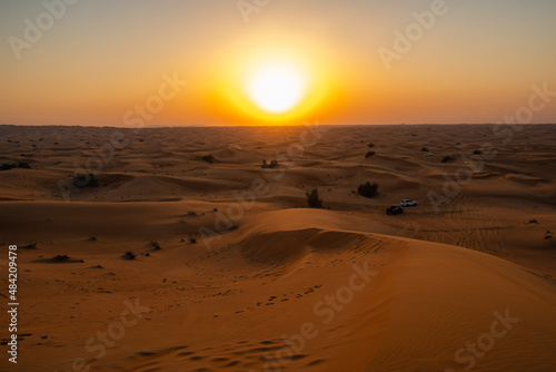 Sunset in the desert dunes of Dubai