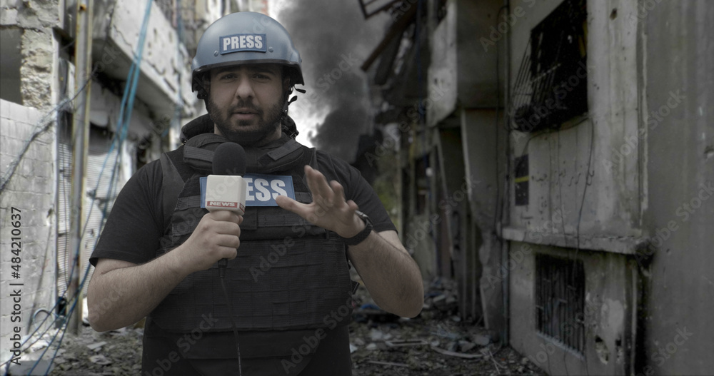 POV Camera view, War journalist correspondent wearing bulletproof vest and  helmet reporting live from destroyed town Stock Photo | Adobe Stock