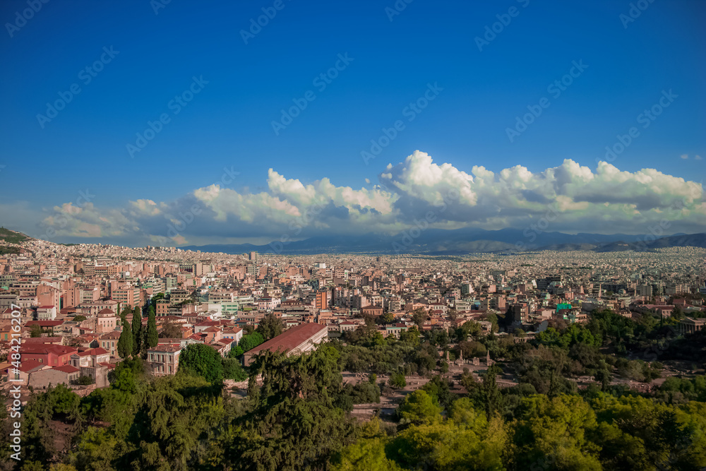 city from above aerial photography of south Europe soft focus on foreground buildings, clear weather day time