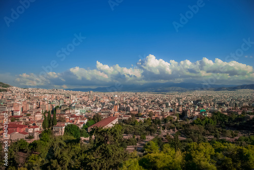 city from above aerial photography of south Europe soft focus on foreground buildings, clear weather day time