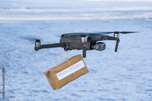 Photography Stockholm, Sweden  A drone flies with a package that says special delivery