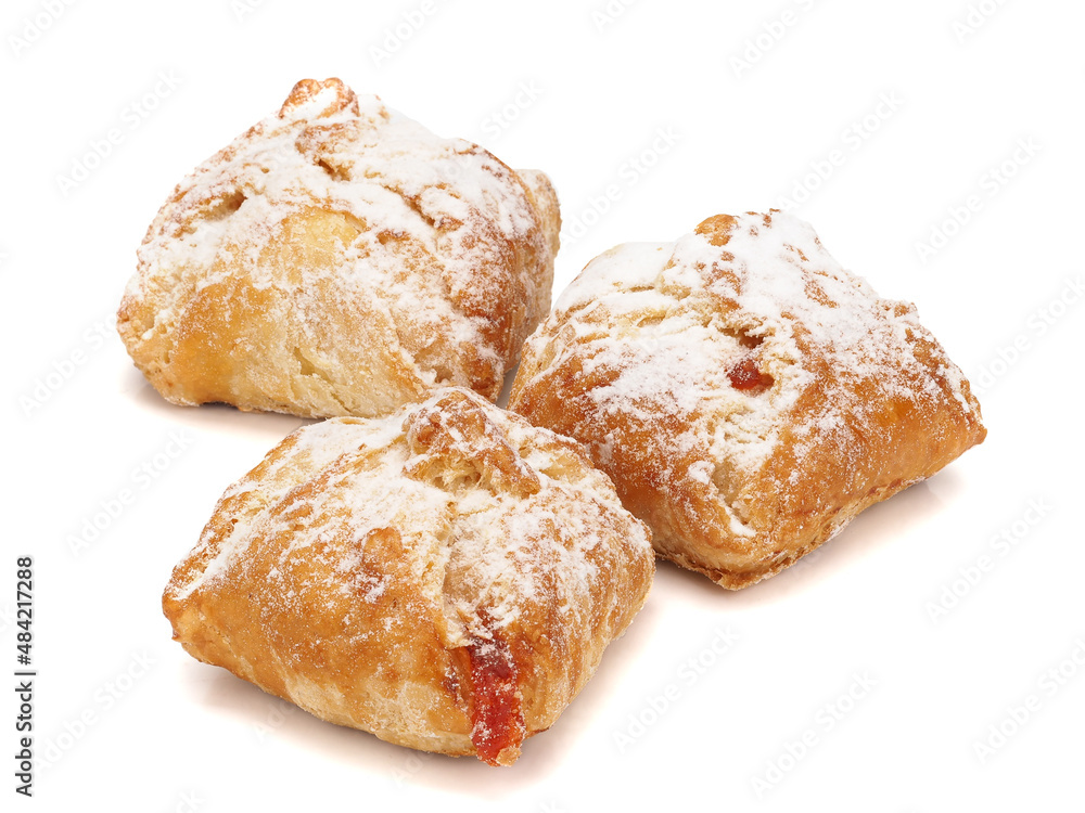Baked puff pastry with fruit filling on white background