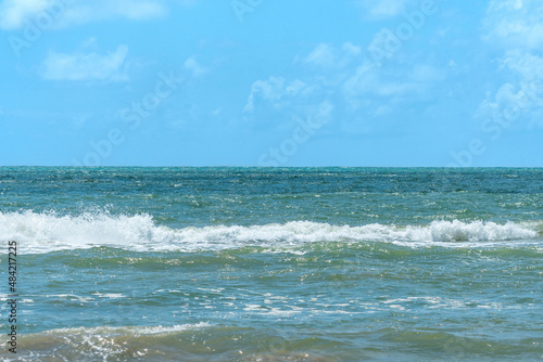 View of the sea and the waves of Recife city, Pernambuco, Brazil. © Vinícius Bacarin