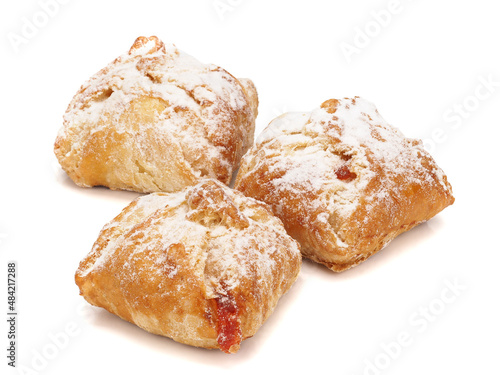Baked puff pastry with fruit filling on white background