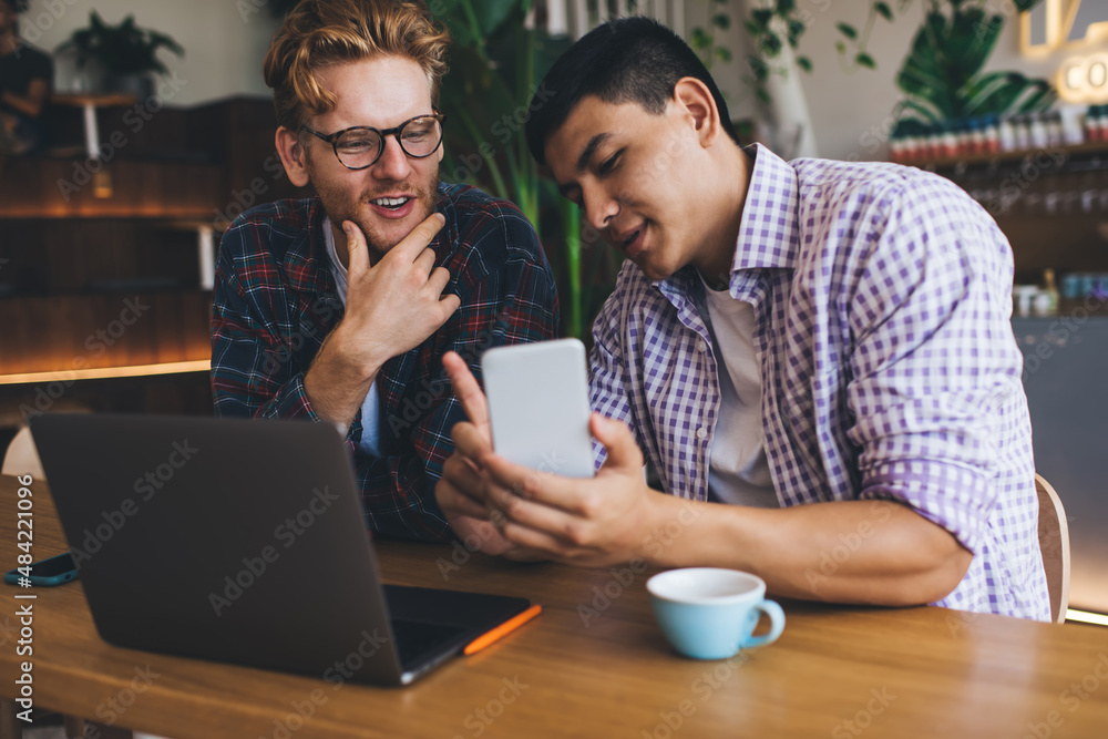 Multiracial business men working in office space Multiracial business men working in office space