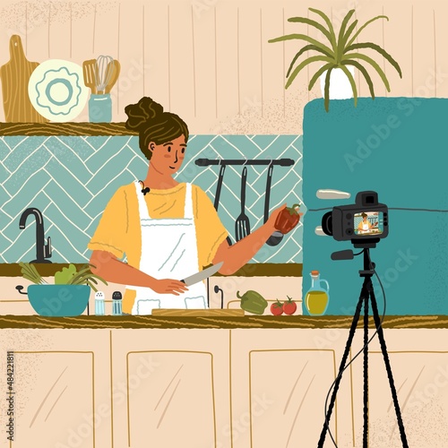 Food video blogger cooking and live streaming online. Woman chef showing recipe on camera in vlog. Cooking class and video tutorial. Vector illustration with cartoon character. Home kitchen studio
