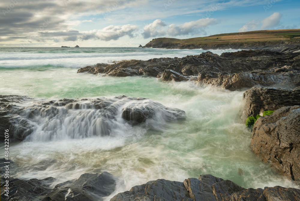 Atlantic waves crashing onto the rocky shores of Booby's Bay near Trevose Head in autumn, Cornwall, England Atlantic waves crashing onto the rocky shores of Booby's Bay near Trevose Head in autumn, Cornwall, England