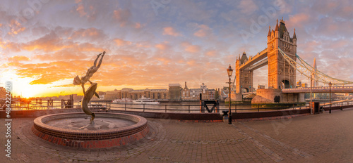 Panoramic view of Tower Bridge, Girl with Dolphin, The Shard and River Thames at sunrise, London, England photo
