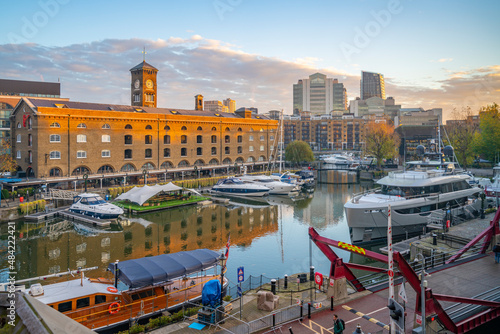 View of St. Katharine Docks from elevated position at sunrise, London, England photo