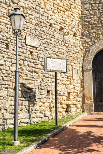 Vertical view of wall and door of San Marino castle.