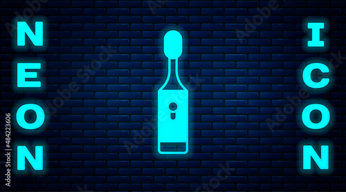Glowing neon Electric toothbrush icon isolated on brick wall background. Vector
