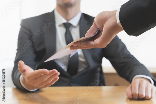 Good job, asian manager man giving financial reward in an envelope, business letter extra salary to company employee, caucasian male worker office hand received premium bonus, getting cheque from boss
