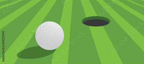 golf ball and playing golf on green ground