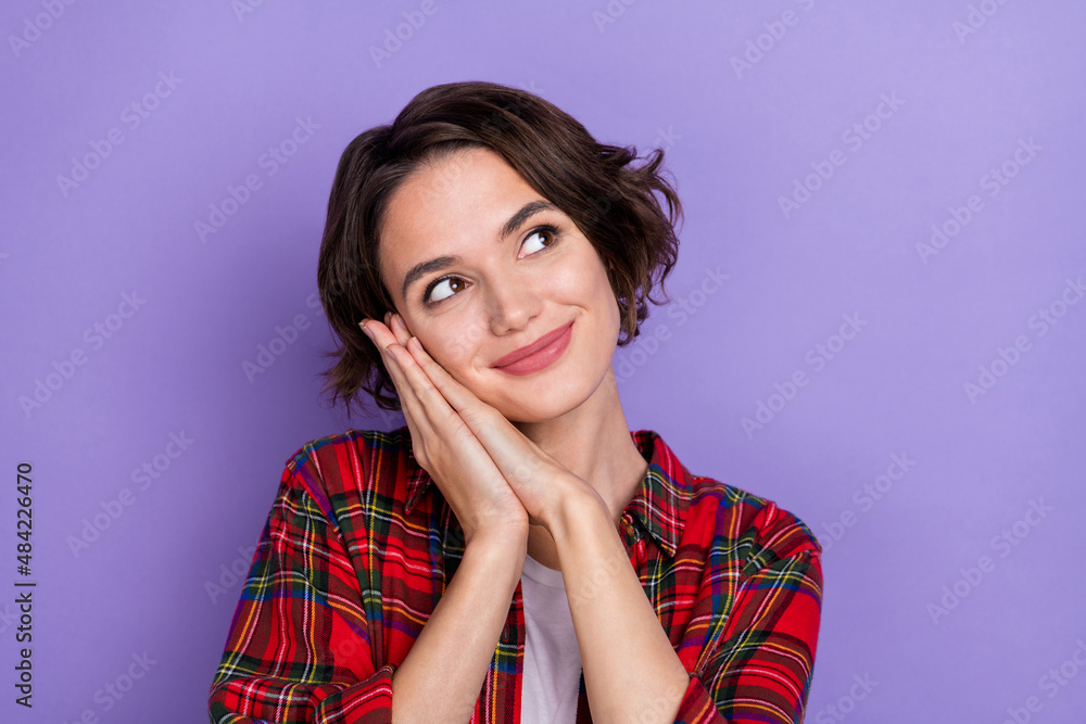 Photo of nice young brunette lady sleep look ad wear red shirt isolated on purple color background Photo of nice young brunette lady sleep look ad wear red shirt isolated on purple color background