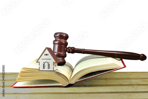 Abstract photo with wooden gavel, beautiful house and open book with codes isolated on white background as symbol of sale of collateral real estate by court decision at auction