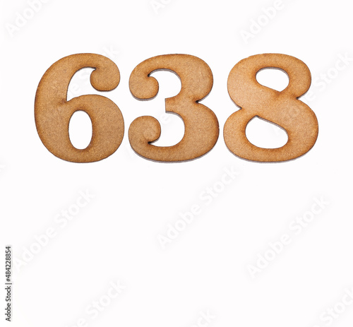 Number 638 in wood, isolated on white background