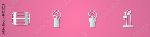 Set paper cut Wooden barrel, Glass of beer, and Beer tap icon. Paper art style. Vector