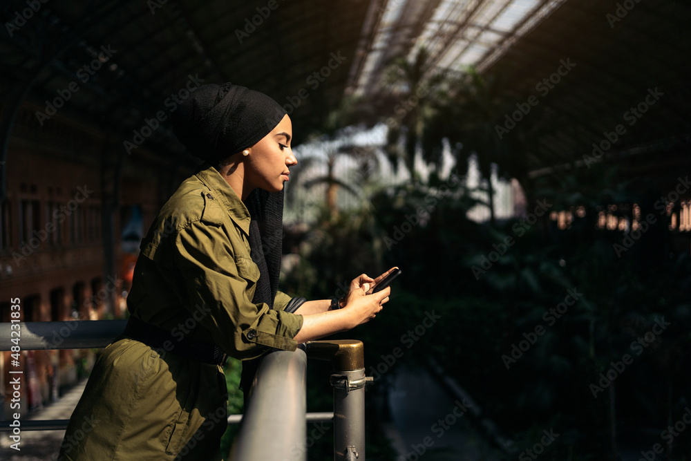 Bussiness muslim woman on a train station Bussiness muslim woman on a train station