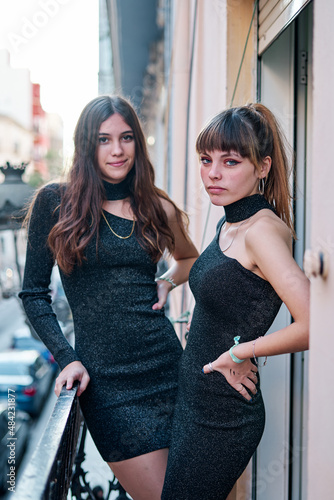 Wallpaper Mural Young beautiful teen women wearing little black dress for party event Torontodigital.ca