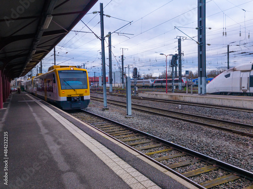 Yellow train on approach at the station, Germany